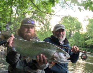 Guide Matt Morrison and John finding a good one as the sun goes on an afternoon float.